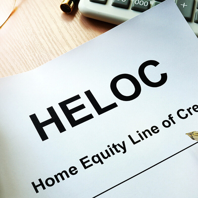 Document HELOC Home equity line of credit on a table.